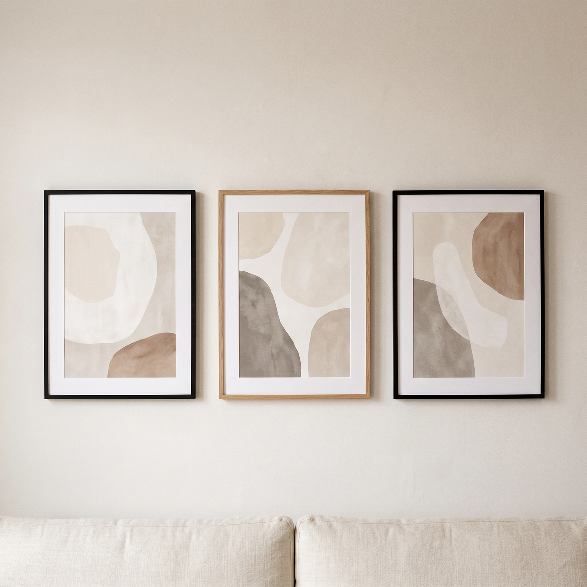 Framed prints on a warm off-white wall